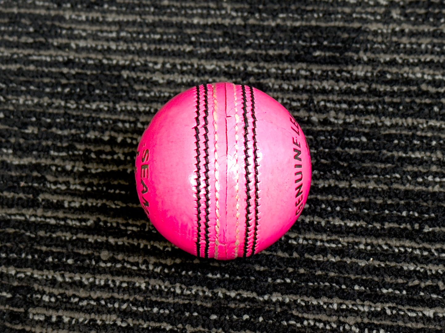 Pack of 6 pink Black Ash Seamer cricket leather balls, premium quality, 156 grams each, suitable for practice and T20 cricket, featuring 4-piece construction and excellent shape retention, machine stitched according to MCC regulations.
