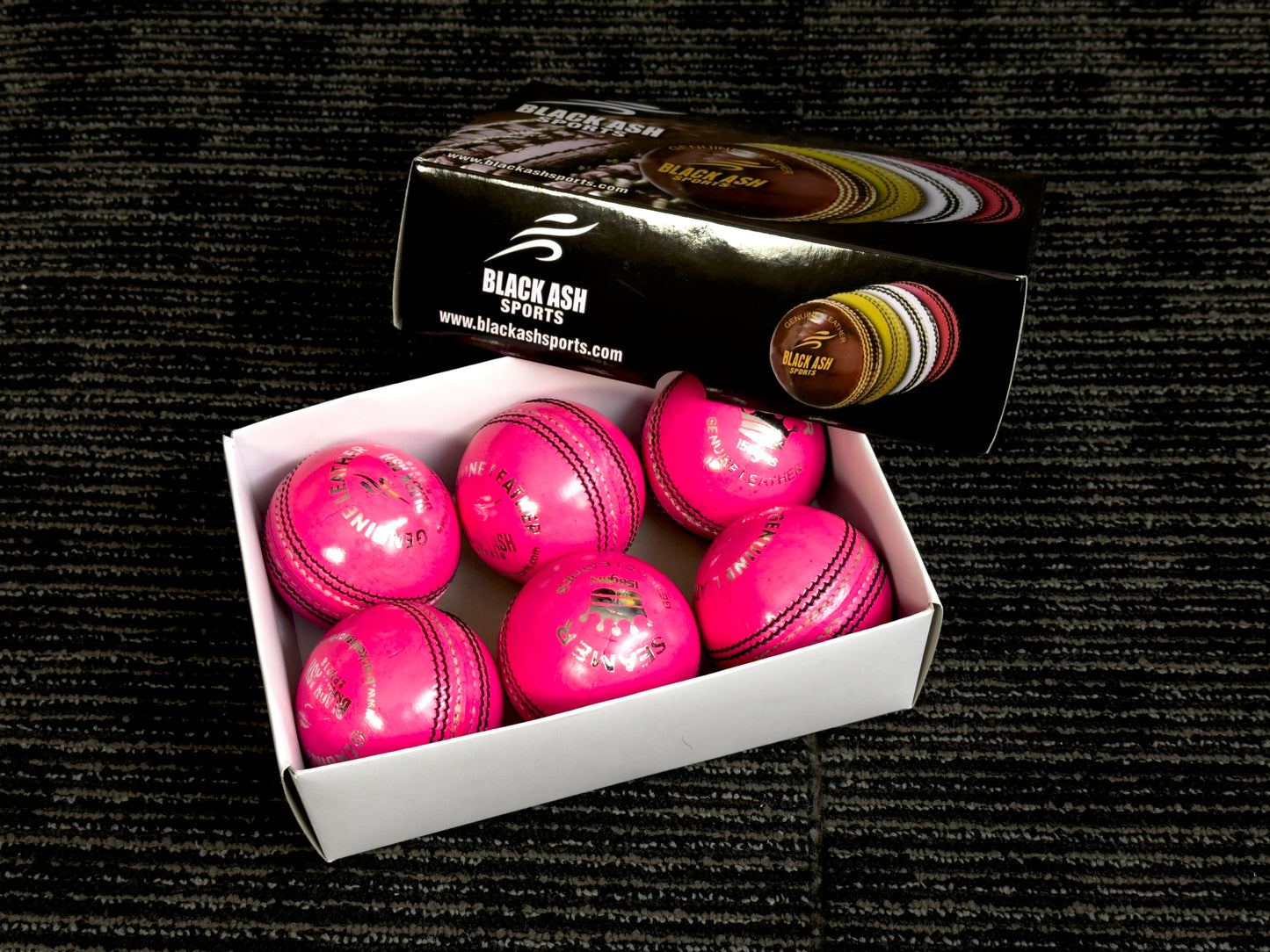 Pack of 6 pink Black Ash Seamer cricket leather balls, premium quality, 156 grams each, suitable for practice and T20 cricket, featuring 4-piece construction and excellent shape retention, machine stitched according to MCC regulations.