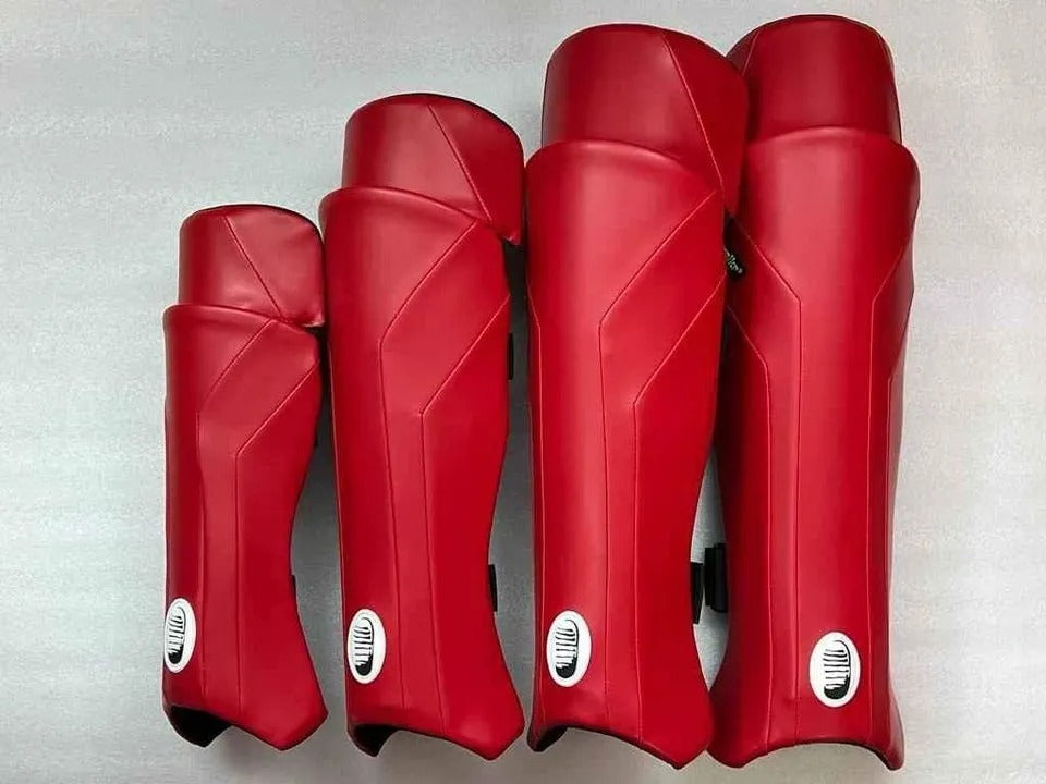 Moonwalkr Exos Leg Guards/Pads, the world's lightest, made with new age lightweight composites from Germany, offering protection at 160 km/hr, 3D moulded for fit and comfort, ambidextrous design, available in yellow, red, and white, made in India.