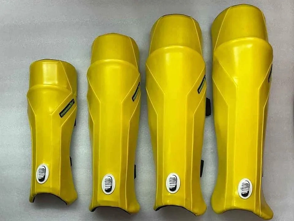 Moonwalkr Exos Leg Guards/Pads, the world's lightest, made with new age lightweight composites from Germany, offering protection at 160 km/hr, 3D moulded for fit and comfort, ambidextrous design, available in yellow, red, and white, made in India.