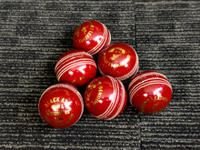 Load image into Gallery viewer, Pack of 6 red cricket balls, &#39;Black Ash Cavalier&#39; series, made from premium quality, genuine Australian alum-tanned leather with 4-piece construction. These waterproof, machine-stitched balls offer excellent shape retention, are suitable for 50 overs, comply with MCC regulations, and weigh 156 grams (5.5 ounces) each.
