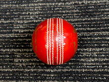 Load image into Gallery viewer, Pack of 6 red cricket balls, labeled &#39;Black Ash Seamer,&#39; made from genuine leather with a 4-piece construction, offering excellent shape retention. These machine-stitched balls are suitable for practice T20 cricket, conform to MCC regulations, and each weighs 156 grams (5.5 ounces).