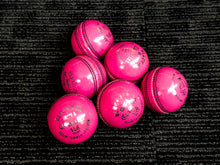 Load image into Gallery viewer, Pack of 6 pink cricket balls named &#39;Black Ash Cavalier,&#39; crafted from premium quality, genuine Australian alum-tanned leather with a 4-piece construction for superior shape retention. These waterproof balls are suitable for 50 overs, conform to MCC regulations, machine-stitched, and each weighs 156 grams (5.5 ounces).