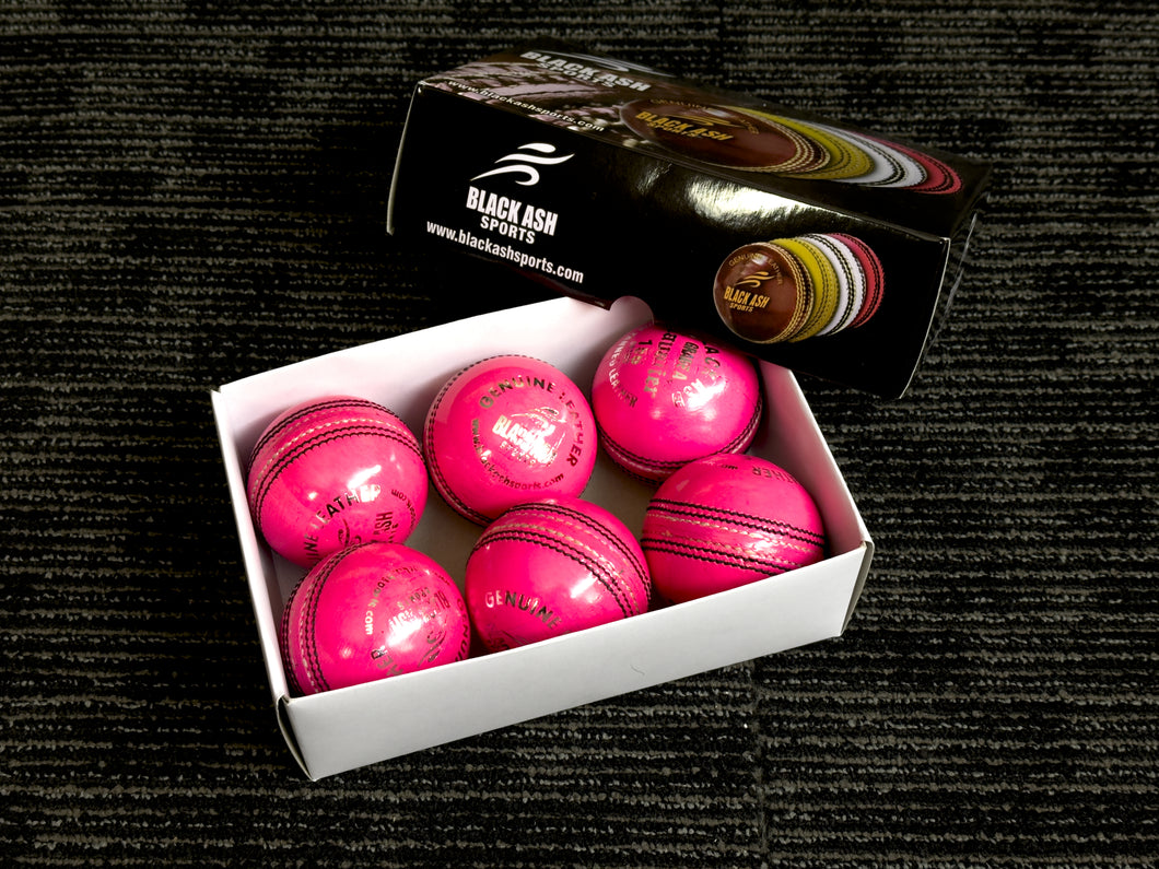 Pack of 6 pink cricket balls named 'Black Ash Cavalier,' crafted from premium quality, genuine Australian alum-tanned leather with a 4-piece construction for superior shape retention. These waterproof balls are suitable for 50 overs, conform to MCC regulations, machine-stitched, and each weighs 156 grams (5.5 ounces).