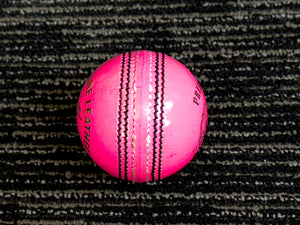 Black Ash Premium grade pack of 6 pink cricket leather balls, each 156 grams, made of genuine leather with 4-piece construction, excellent shape retention, suitable for 30 to 35 overs, and meeting MCC regulations.
