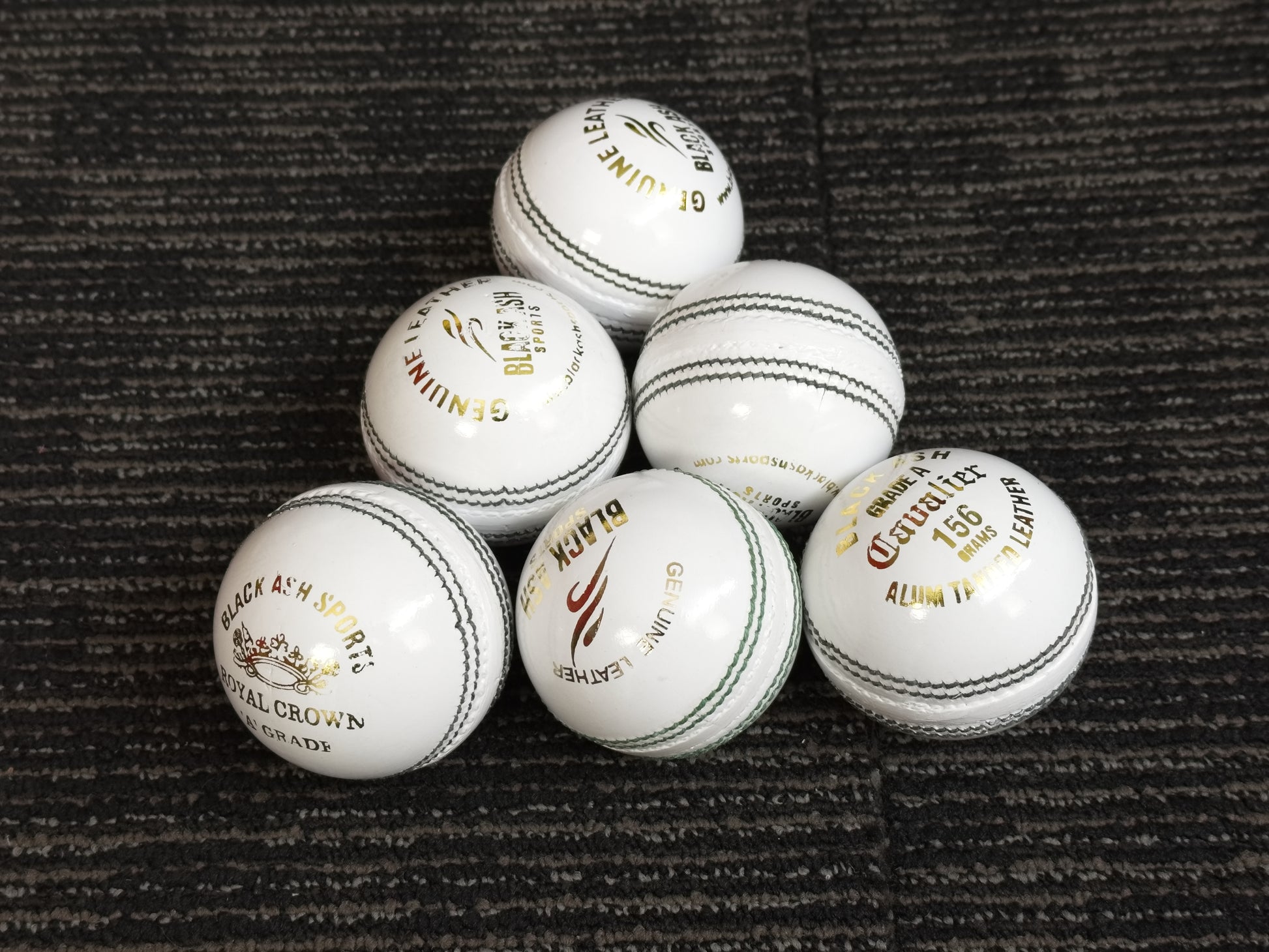 Black Ash Royal Crown pack of 6 white cricket leather balls, 156 grams, premium quality, suitable for 35 to 40 overs, with 4-piece construction, excellent shape retention, and MCC regulations compliant.