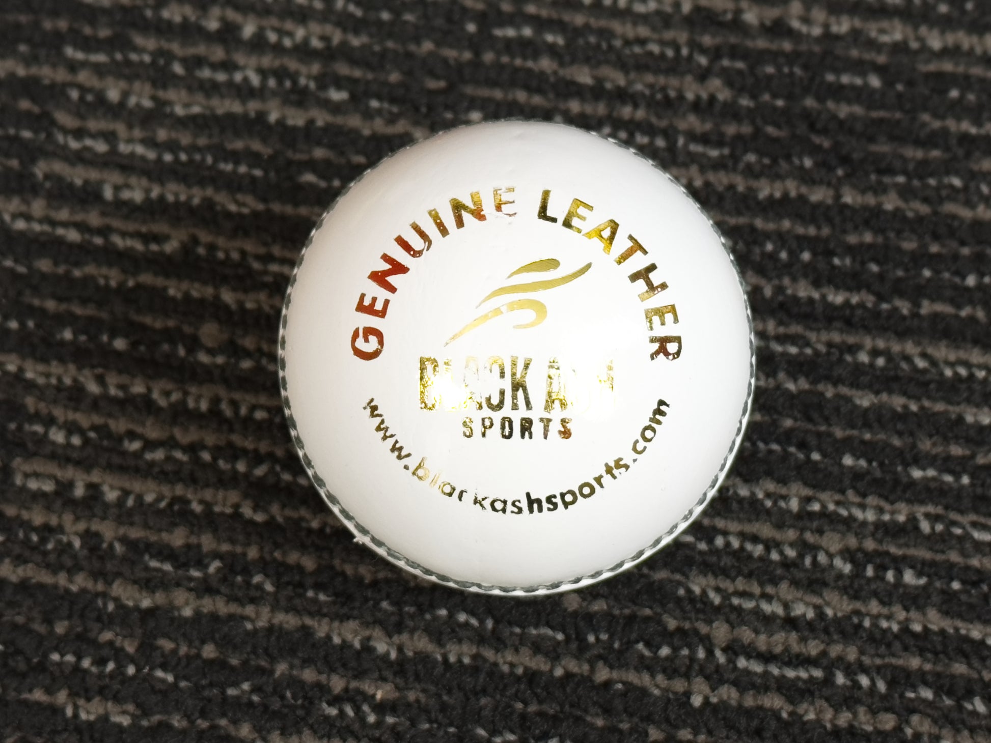 Pack of 6 white cricket balls from Black Ash Premium grade, made of genuine leather with 4-piece construction for excellent shape retention. These premium quality balls are machine-stitched, adhere to MCC regulations, and are ideal for 30 to 35 overs, each weighing 156 grams (5.5 ounces).