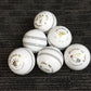 Pack of 6 white Black Ash Royal Crown cricket leather balls, 156 grams, designed for practice T20 cricket, with premium quality genuine leather, 4-piece construction, and meeting MCC standards