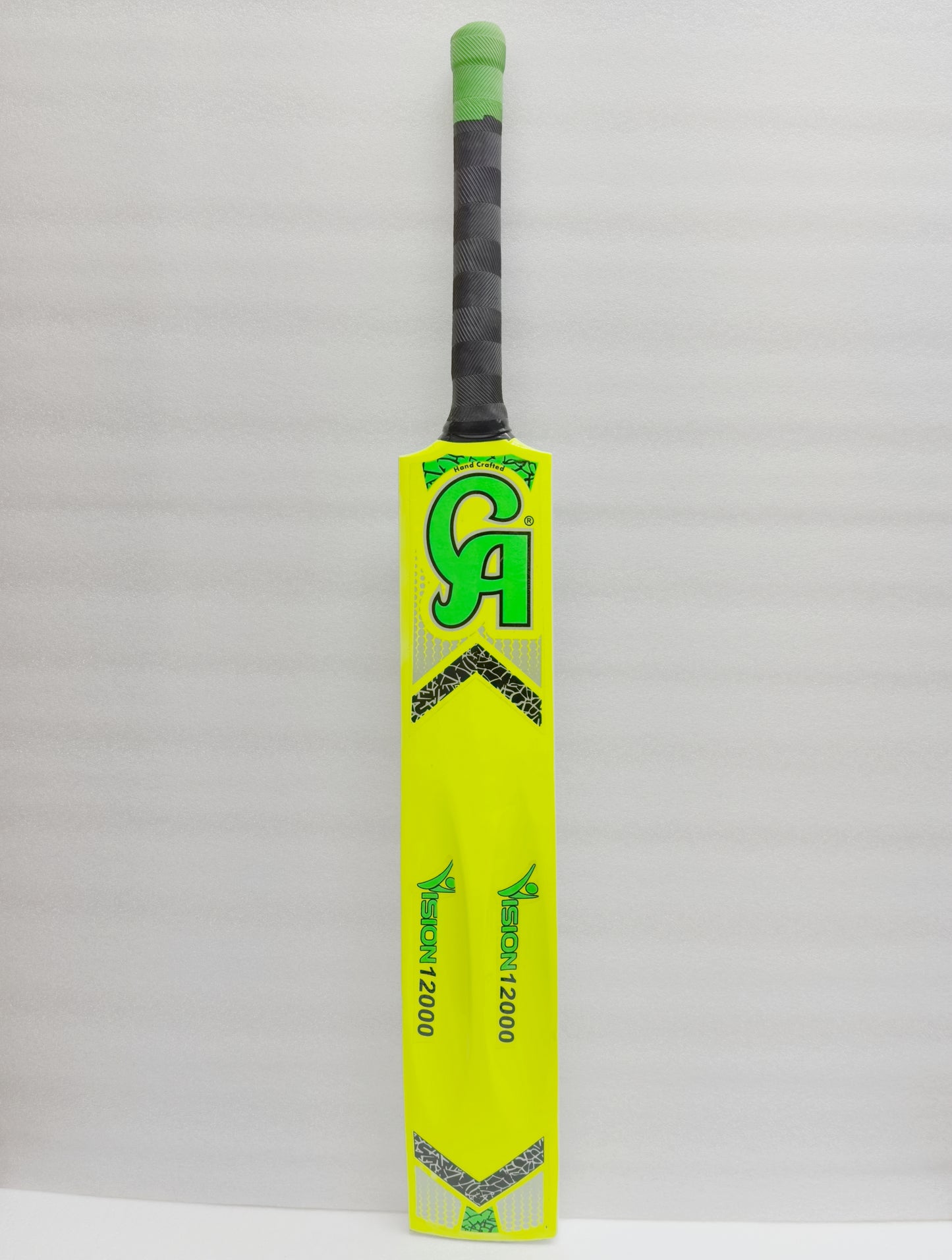 CA Vision 12000 tennis ball cricket bat in lime green, made of Poplar wood with full cane handle and thick edges for lightweight handling, ideal for tape ball cricket tournaments with a double-colored grip.