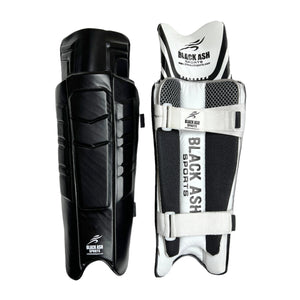 Black Ash Signature Batting Pads in Black, offering premium quality, lightweight and ultra-comfortable design with 3 Velcro straps, suitable for players seeking protection without sacrificing mobility, available in multiple colors.