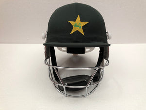 Black Ash custom International adjustable helmet, featuring a high impact polypropylene shell and chrome finish steel grill with 8 micro adjustments for enhanced protection and visibility, sweat-absorbent padding, and soft ear protection, adjustable to fit sizes 52-58 cm.