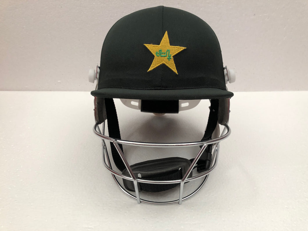 Black Ash custom International adjustable helmet, featuring a high impact polypropylene shell and chrome finish steel grill with 8 micro adjustments for enhanced protection and visibility, sweat-absorbent padding, and soft ear protection, adjustable to fit sizes 52-58 cm.