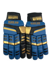 Load image into Gallery viewer, Blue/Gold Cricket Batting Gloves by Black Ash, offering light-weight high-density foam for protection, strong inserts for additional finger protection, full leather palm, and available for both right and left-hand players in blue and gold.