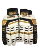 Load image into Gallery viewer, White/Gold Cricket Batting Gloves by Black Ash, with light-weight high-density foam, strong inserts in fingers for added protection, full leather palm and thumb, two-piece thumb for comfort, in white and gold.