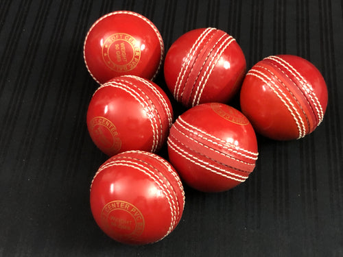 Pack of 6 Black Ash soft cricket training balls in red color, each weighing 90 grams, made of top-quality PVC with a soft center inside. Recommended for coaching and training purposes, suitable for both indoor and outdoor cricket play.