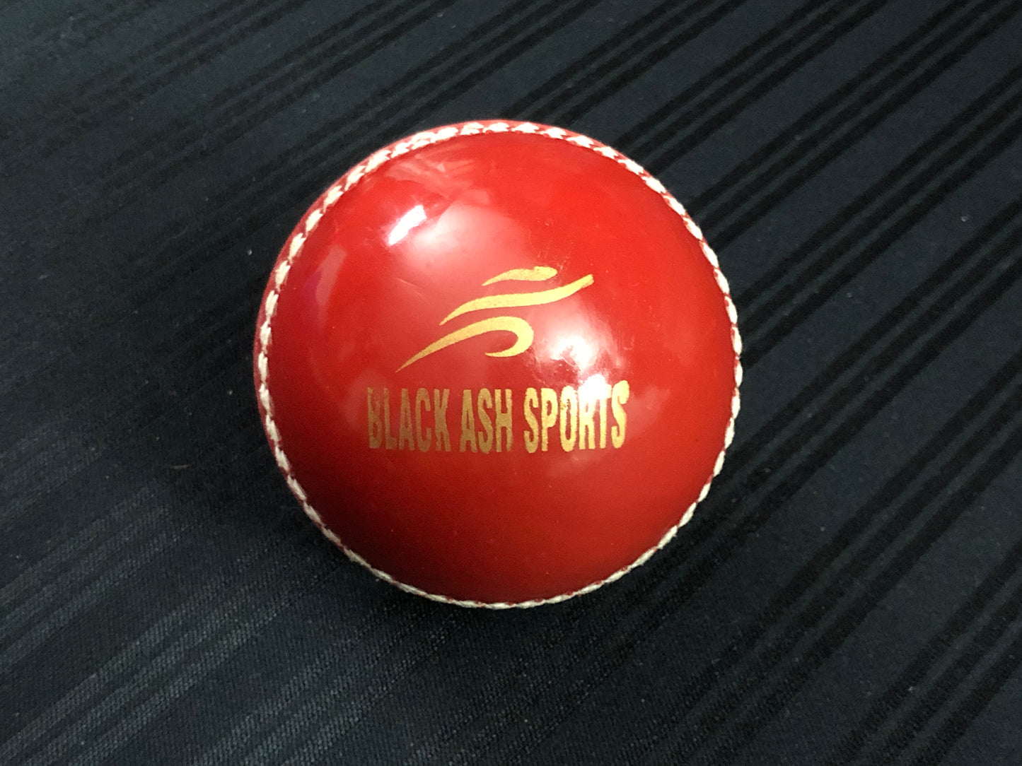 Pack of 6 Black Ash soft cricket training balls in red color, each weighing 90 grams, made of top-quality PVC with a soft center inside. Recommended for coaching and training purposes, suitable for both indoor and outdoor cricket play.
