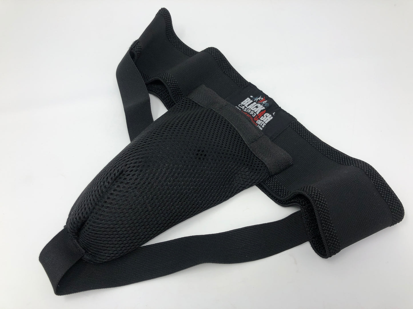 Black Ash abdominal guard with strap, made of solid polyethylene, featuring rubber edges for comfort, ventilated design for air circulation, ensuring protection during play