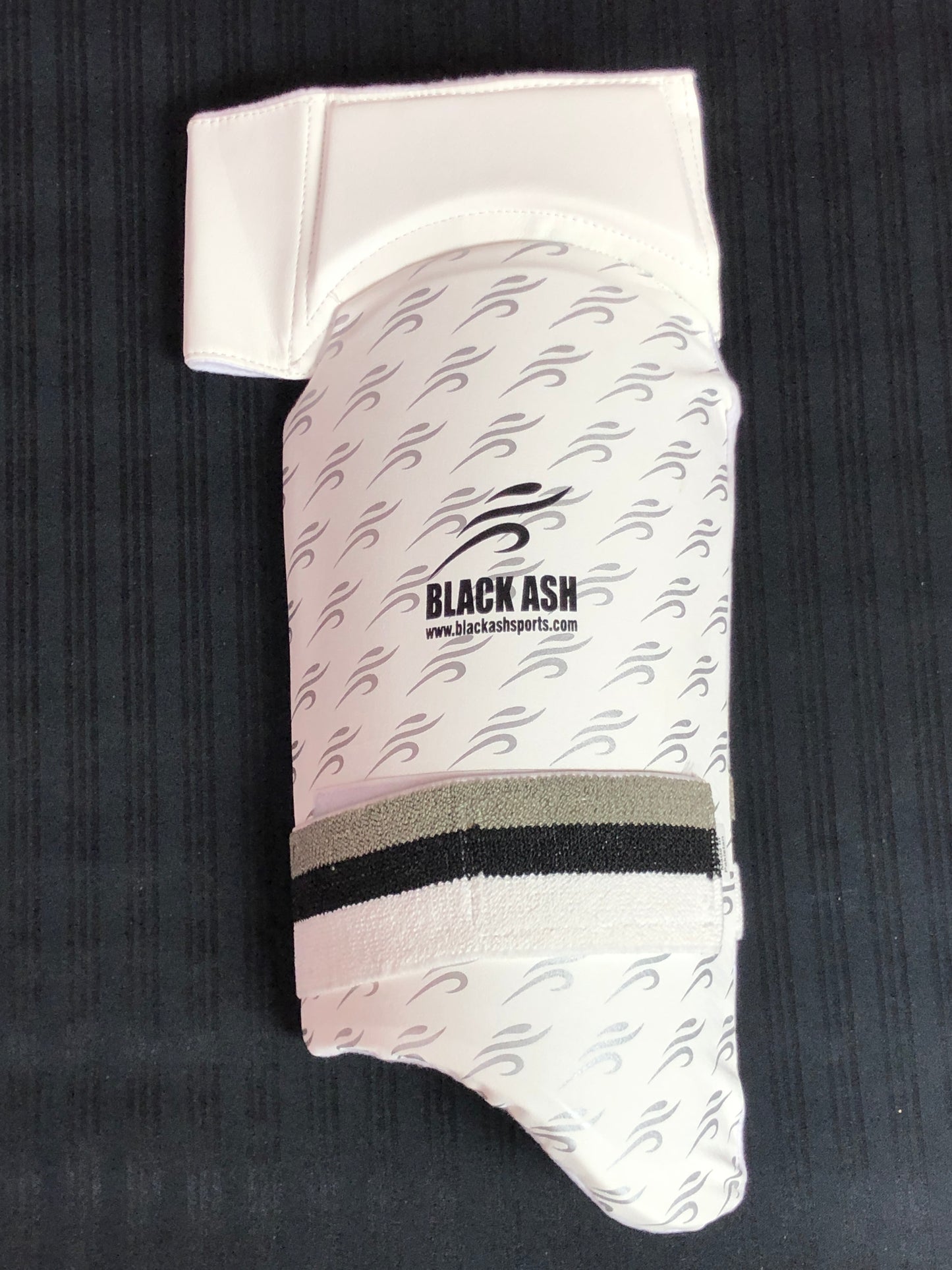 Black Ash combo thigh guard, ultra lightweight with phenomenal protection, designed for professional-level comfort and ease of movement. Features fully adjustable components for a custom fit, Velcro strap with towel lining for comfort, available in multiple sizes from XS to L.