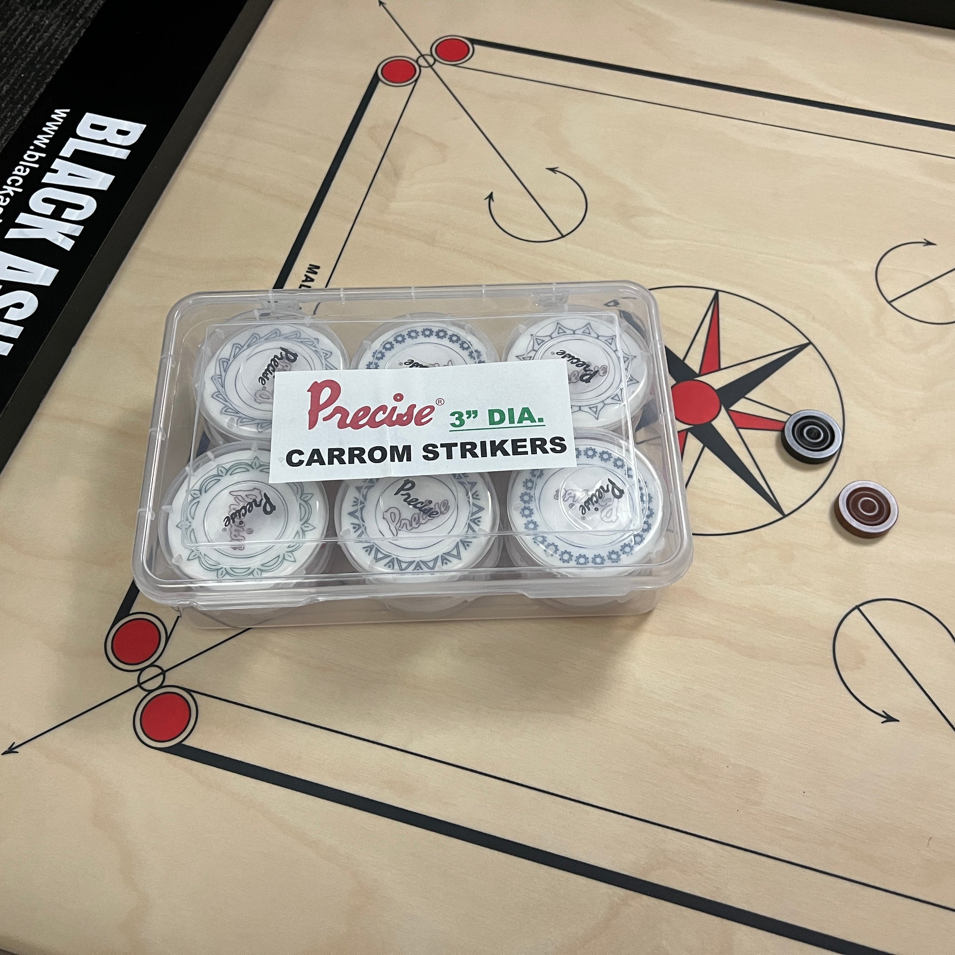 3.0 inch Precise carrom striker for professional and club players, weighing approximately 41 grams, each with a unique design, available at Black Ash Sports.