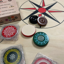 Load image into Gallery viewer, Home-use Precise Popular carrom striker, made of highly polished ceramic, weighs approximately 15 grams, each with a unique design, sold exclusively by Black Ash Sports.