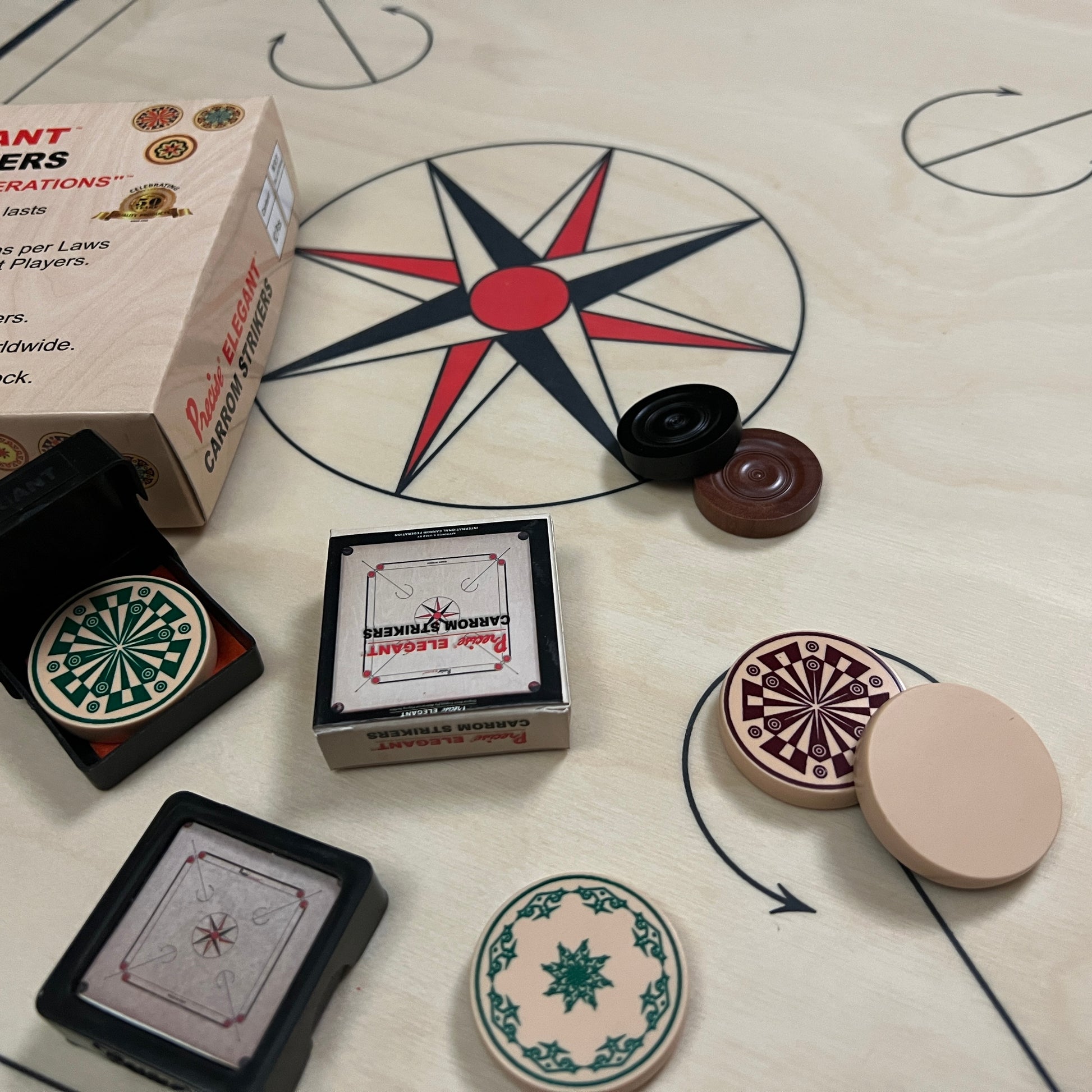 Tournament-grade Precise Elegant carrom striker, uniquely packed in a patented carrom shape box, exclusively available at Black Ash Sports.