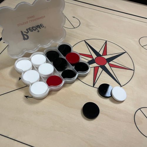 Set of PRECISE Superb 6mm plastic carrommen, standard and uniform in weight, size, and color, packaged in a specially designed plastic box, available through Black Ash Sports.