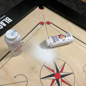 Triple pack of Precise Elegant carrom powder in 180g bottles with sifter caps for easy use, designed for superior carrom boards and endorsed by Black Ash Sports.