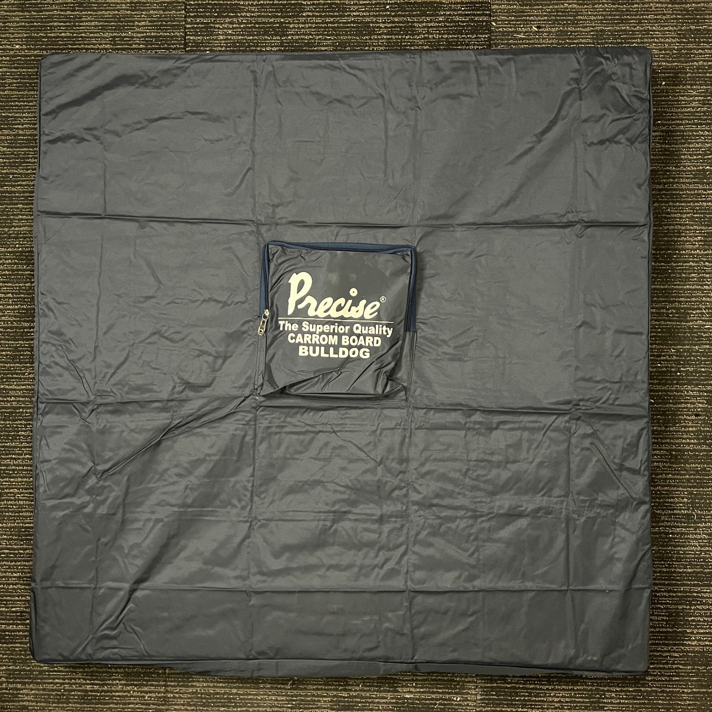 Durable rexine carrom board protective cover for 37x37 inch boards, includes a pocket for accessory storage, designed to protect the playing surface, available in multiple sizes.