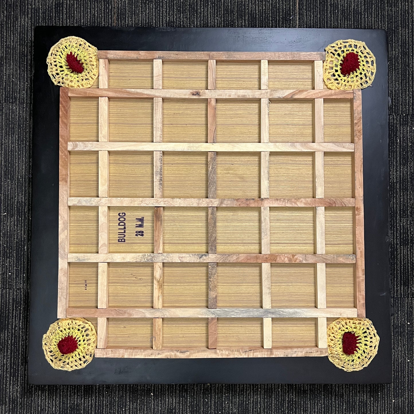 Precise Bulldog Elegant carrom board, 28mm thick English Birchwood ply, 37x37 inches overall size with a 29x29 inch playing area and 4-inch borders. Comes with a striker and a set of coins, known for its super satin smooth tournament playing surface.
