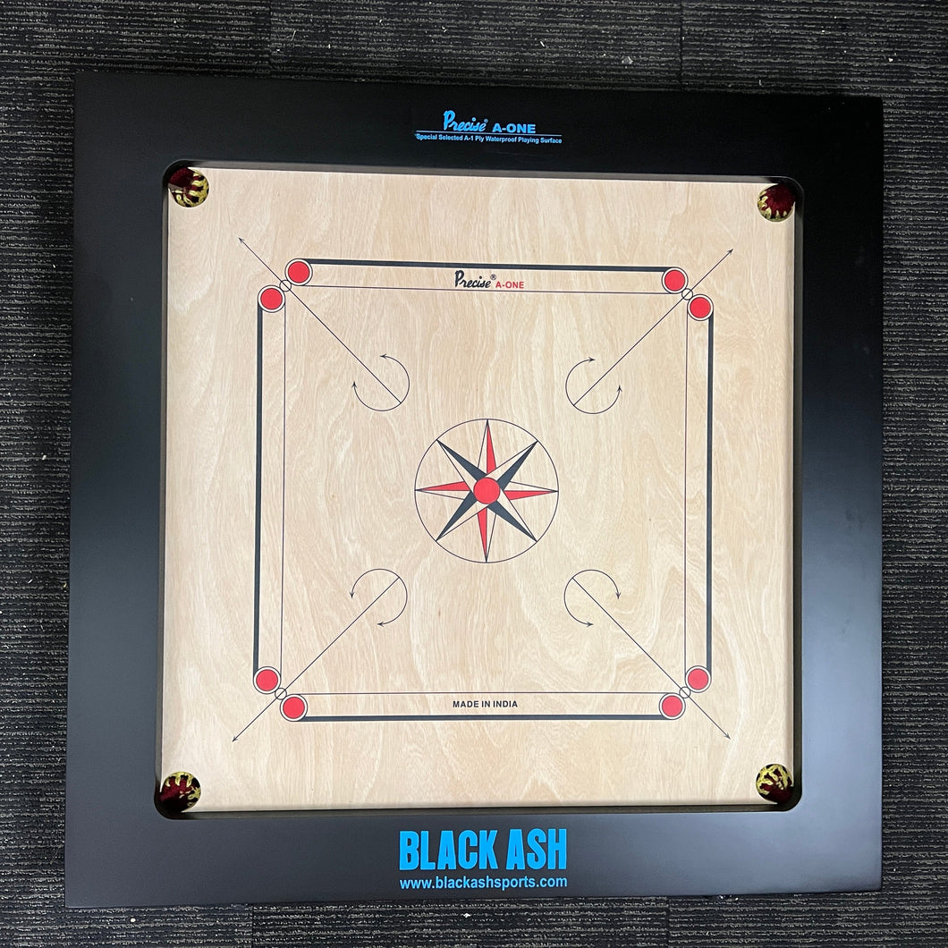 PRECISE Bulldog A-One carrom board, 24mm thick special selected A-One waterproof ply, 37x37 inches overall with a 29x29 inch playing area and 4-inch borders. Comes with a striker and set of coins, approved for use in state ranking tournaments