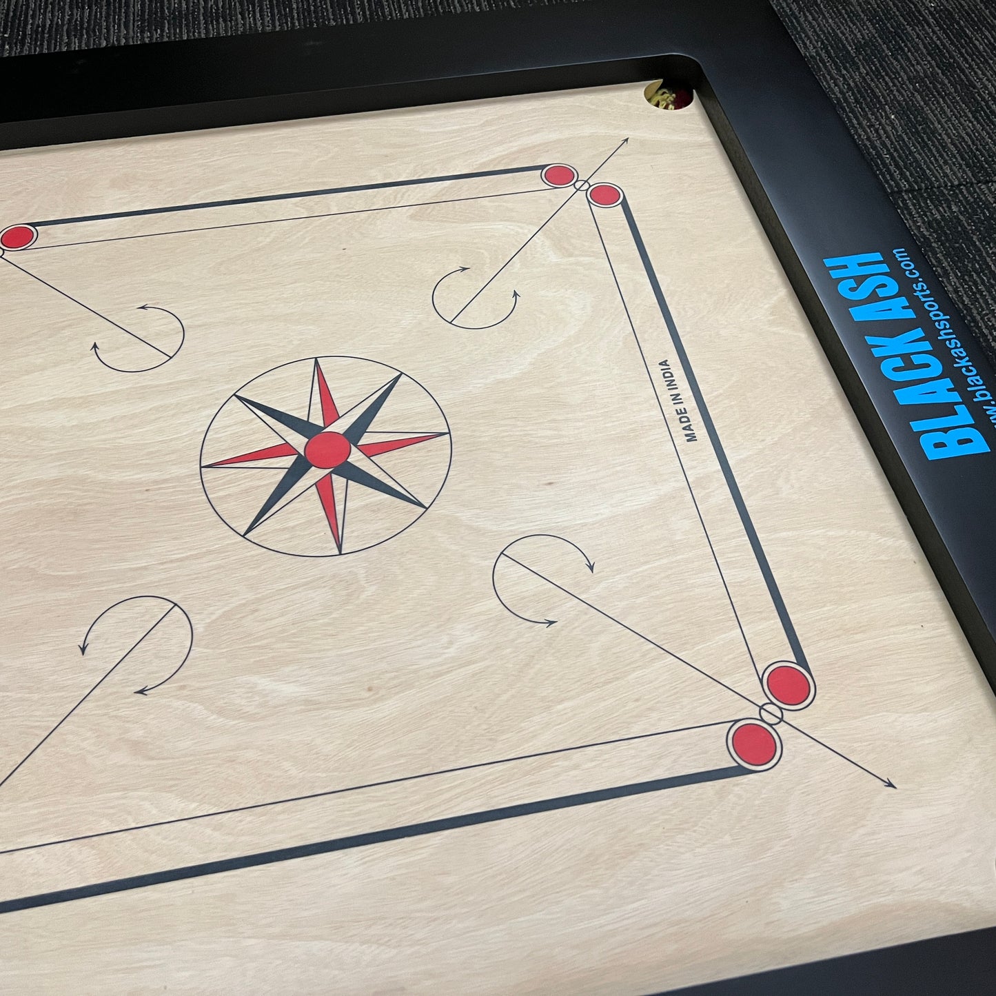 PRECISE Bulldog A-One carrom board, 24mm thick special selected A-One waterproof ply, 37x37 inches overall with a 29x29 inch playing area and 4-inch borders. Comes with a striker and set of coins, approved for use in state ranking tournaments