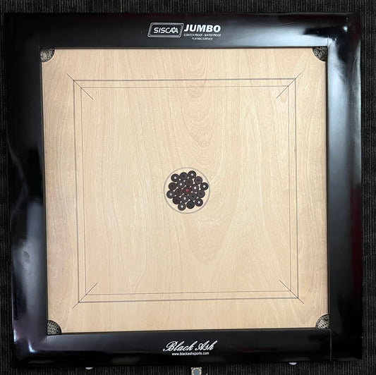 Black Ash 'Jumbo' high-end special edition carrom board by SISCAA, made of English Birchwood, 51x51 inches with a 41x41 inch playing area, 12mm sheet thickness, and 5-inch borders. Includes premium finish, fast rebound borders, heavy-duty back support, high-end coins, and 2 strikers.