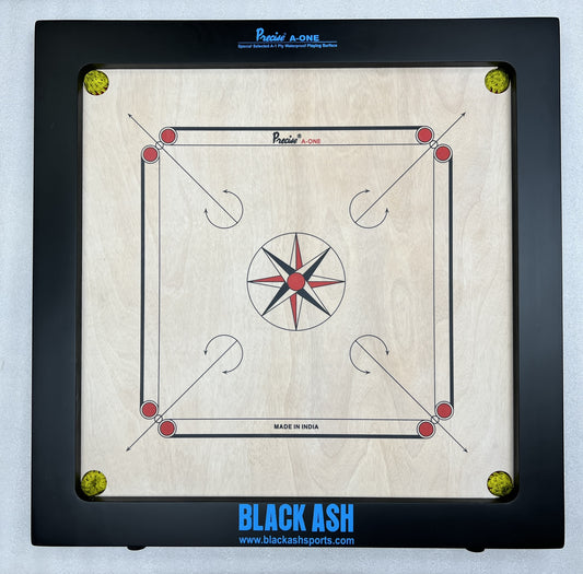 PRECISE Champion A-One carrom board with 12mm thick special selected A-One waterproof ply, measuring 35x35 inches overall with a 29x29 inch playing area, and 3-inch borders. Includes strong hand-knitted wool nets, a striker, and a set of coins.