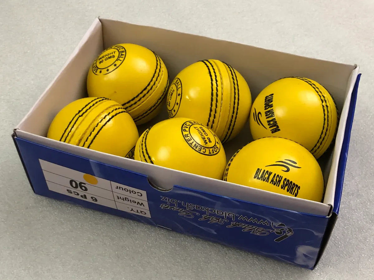 Pack of 6 yellow Black Ash PVC soft cricket training balls, each weighing 90 grams, crafted from top-quality PVC with a soft center for enhanced playability. Ideal for coaching and training, these balls are suitable for both indoor and outdoor cricket activities.